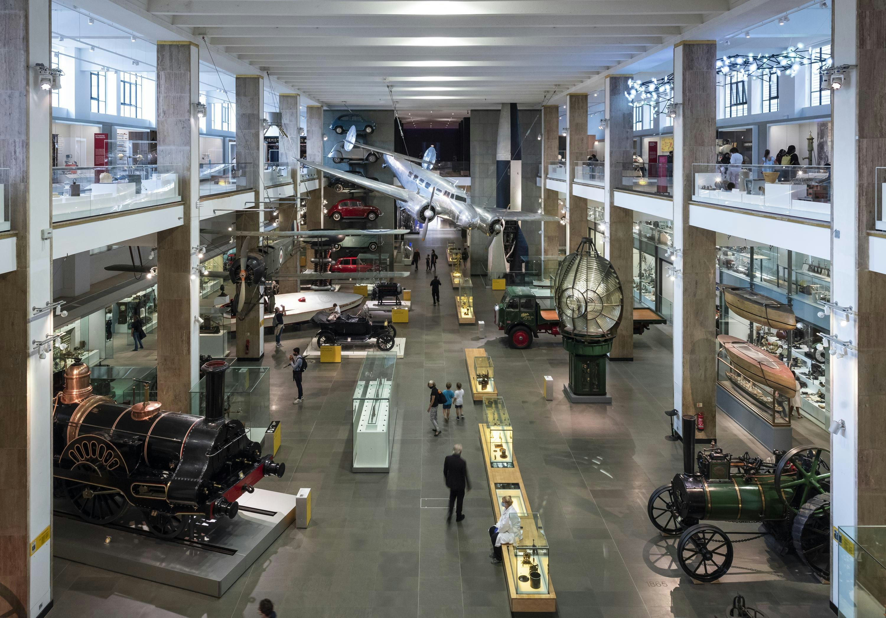 Images of families enjoying the museum on the first day of opening, abiding by social distancing/Covid-19 regulations. General shots for external Comms which show people enjoying our museum safely. Making of The Modern World Gallery, Science Museum, London, August 2020.